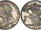 a close up of a coin with a woman on a horse