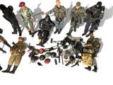 a lot of action figures that are on a white surface