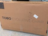 a cardboard box with a logo on it sitting on the ground