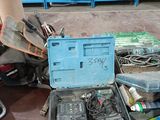 a blue tool box sitting on top of a table