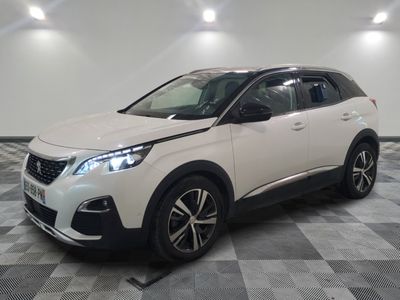 the white car is parked in a large room with checkered floor