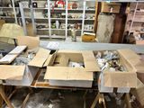 many boxes that are sitting on a table in a room