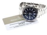 an image of a wrist watch with a card attached to it