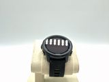 an image of a smart watch on a stand on a white surface
