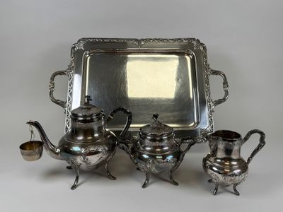 Partie de service à thé en métal argenté à décor feuillagé c… - Photo 1