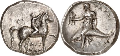 a silver coin with an image of a woman on a horse