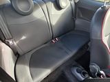 a picture of the interior of a car with the seats down