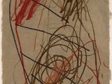 une image représentant un dessin d'un objet rouge et noir sur une feuille de papier