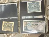three different types of paper money in a case