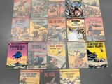 a lot of comic books that are on the floor