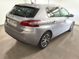 a picture of a silver car parked in a garage