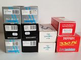 several boxes of cigarettes sitting on a table next to each other