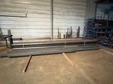 a large warehouse with a lot of steel pipes