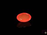an image of a red object on a black surface