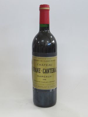 a bottle of wine that is sitting on a table