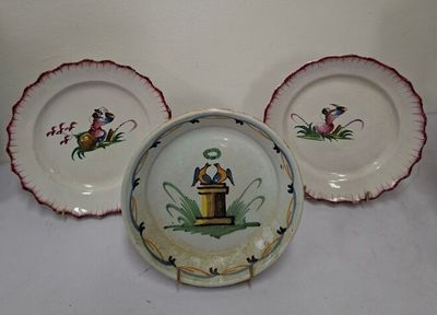 three plates that have different designs on them