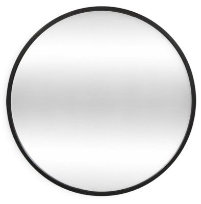 a round mirror with a black frame on a white wall