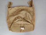 an image of a brown bag with a small hole in the middle