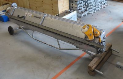 an image of a conveyor belt in a warehouse