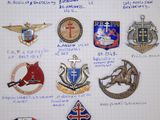 many different types of badges on a piece of paper