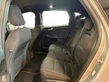 the interior of a car with two rows of seats in it