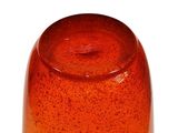 an orange glass vase with a brown base on a white background