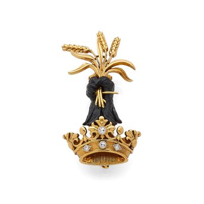 une image représentant une broche en or et diamants ornée d'une couronne