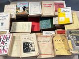 a lot of books that are on a table