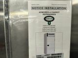 a sign that says notice installation attached to a refrigerator