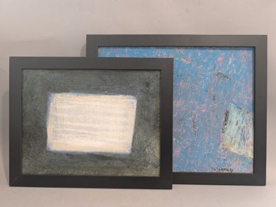 deux tableaux encadrés représentant un carré blanc et un carré bleu