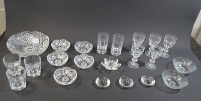 a lot of glass items that are on a table