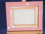 a picture of an easel with a painting on it