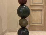 a tall sculpture made of rocks on top of each other
