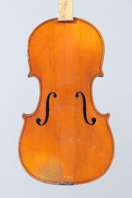 an old violin with a bow on a white background