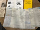 a table with a bunch of papers on it