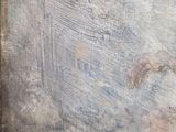 a picture of a painting on a wooden table