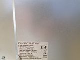 an image of a close up of a metal object with a sticker on it