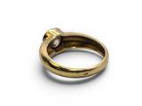 a close up of a gold ring on a white surface