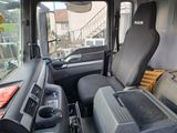 an image of a truck with a seat and a console