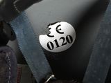 a close up of a motorcycle helmet with a sticker on it