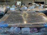 many boxes that are wrapped up and ready to be shipped