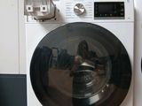 a washing machine that is sitting on the floor