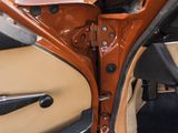 a close up of a car door with the door handle open