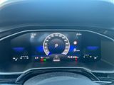 the dashboard of a car with a digital display on it