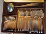 silverware in a box with spoons and spoons in it