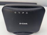 an image of a d - link router on a table