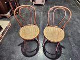 two chairs that are sitting next to each other on the floor