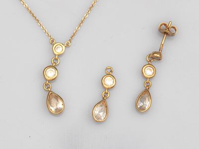 a gold necklace and earring set