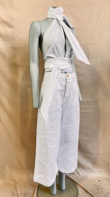 an image of a mannequin wearing a white dress