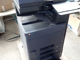 a printer that is sitting on top of a pallet